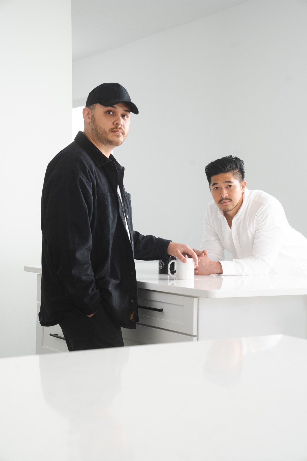 Alan and Shamie in a bright modern kitchen